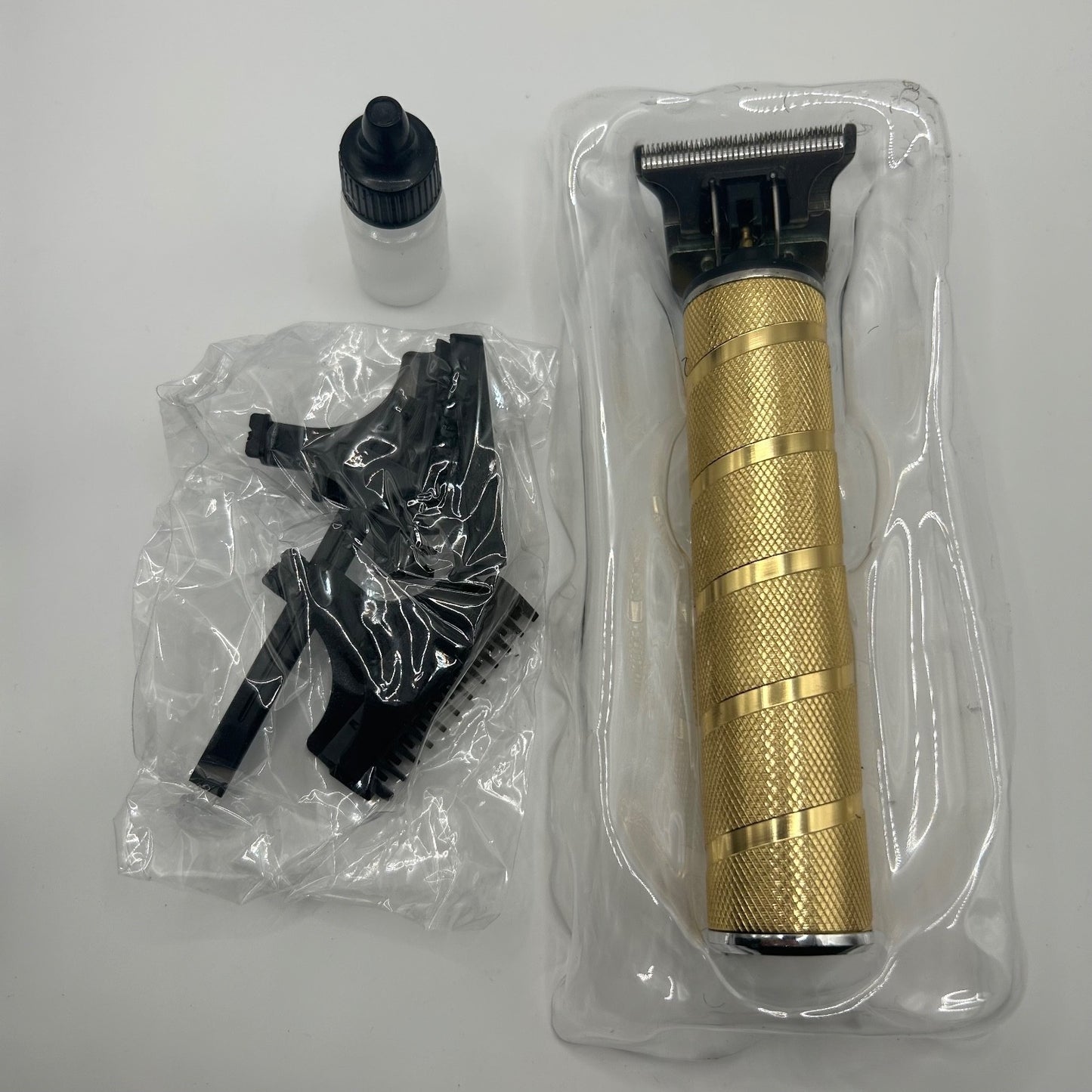 Ufree U-1157 Hair Trimmer – Cordless Metal Body, T-Blade, Gold, w/ Attachments